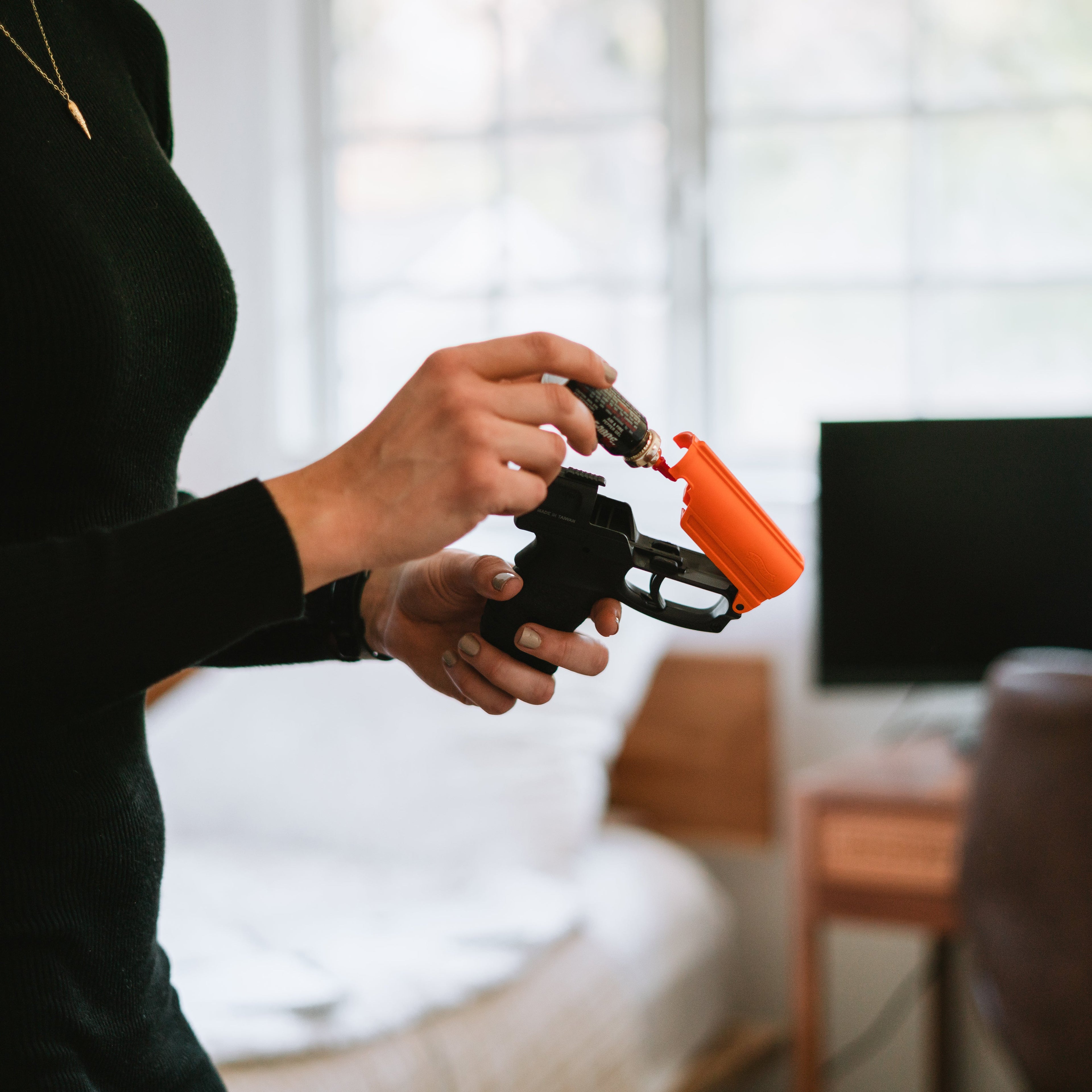 SABRE Aim and Fire Pepper Gel complete kit including practice cartridge, live gel, and training target – non-lethal self-defense system