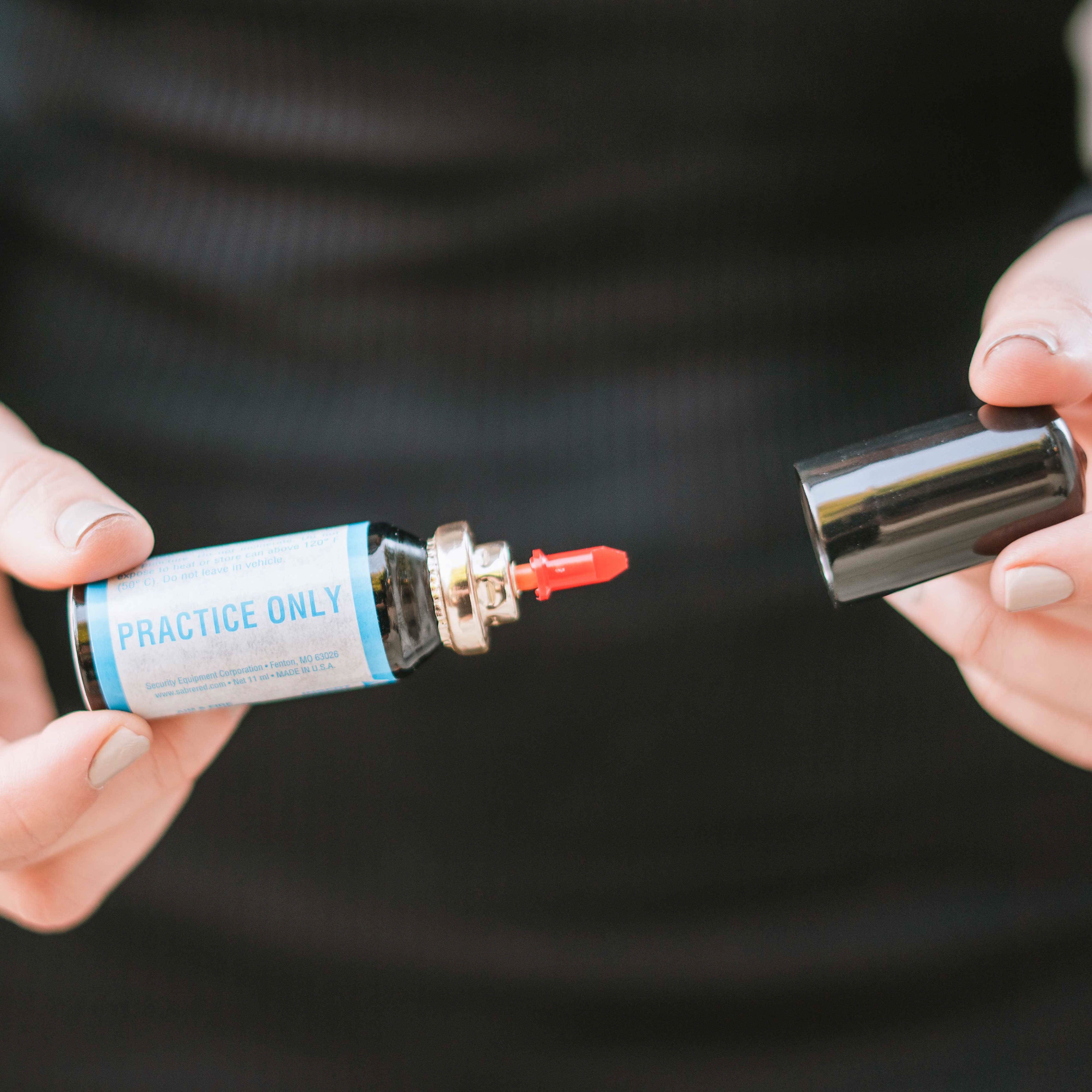 SABRE Aim and Fire Pepper Gel complete kit including practice cartridge, live gel, and training target – non-lethal self-defense system