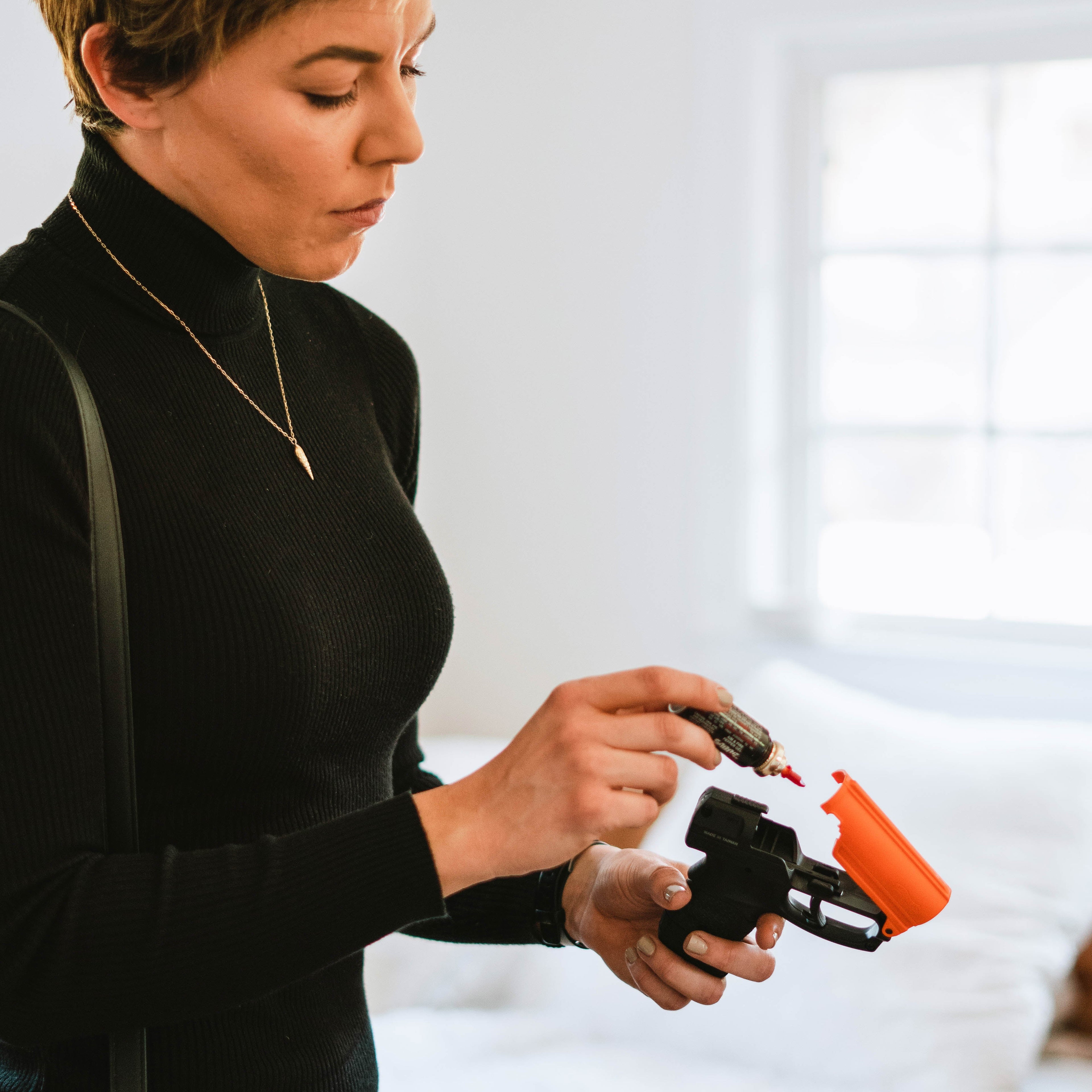 SABRE Aim and Fire Pepper Gel complete kit including practice cartridge, live gel, and training target – non-lethal self-defense system