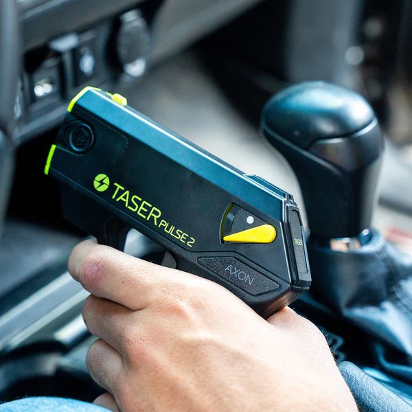 TASER Pulse 2 compact self-defense device with integrated laser sight and flashlight